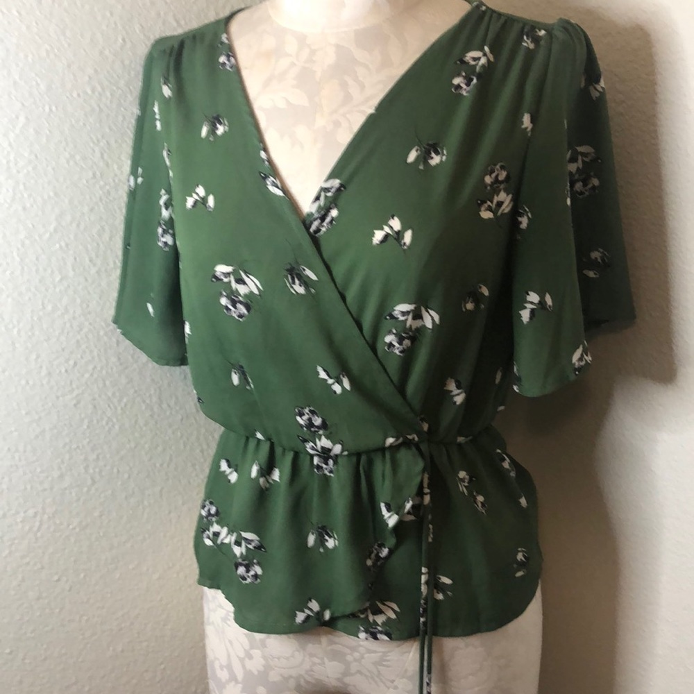 Green floral blouse